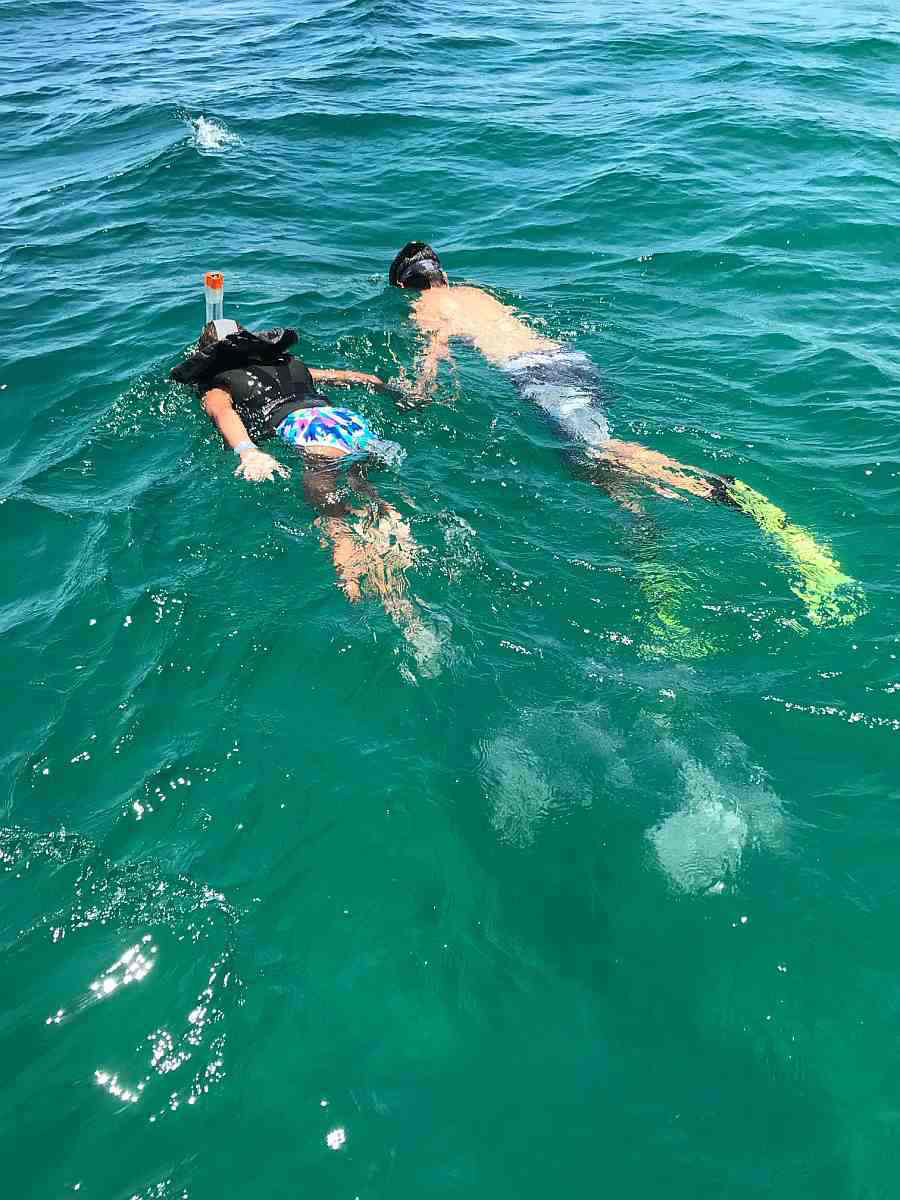 Mate Jack takes 8 year old Marley for a snorkel tour of the Lobsta Wreck