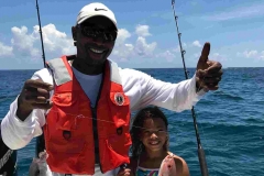 David and Marley with a doubleheader - strawberry snapper and blue runner