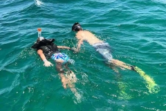 Mate Jack takes 8 year old Marley for a snorkel tour of the Lobsta Wreck